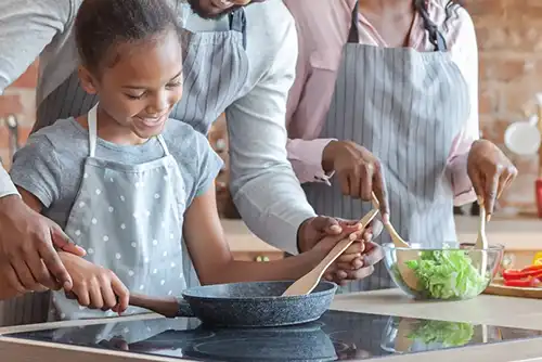 Teaching cooking to a child